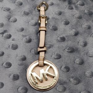 Michael Kors Gold and Tan Handbag Tag